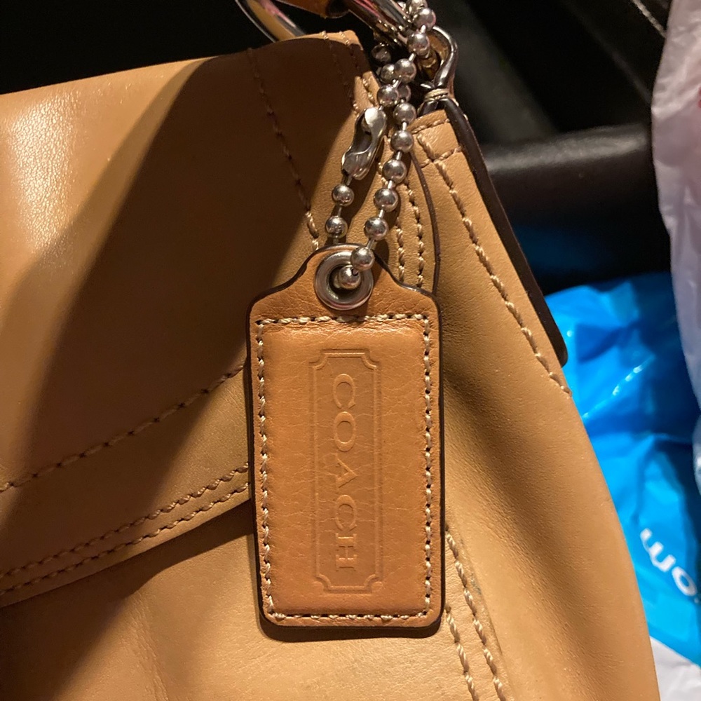 Very cute, In very good condition, looks new, used once Coach handbag